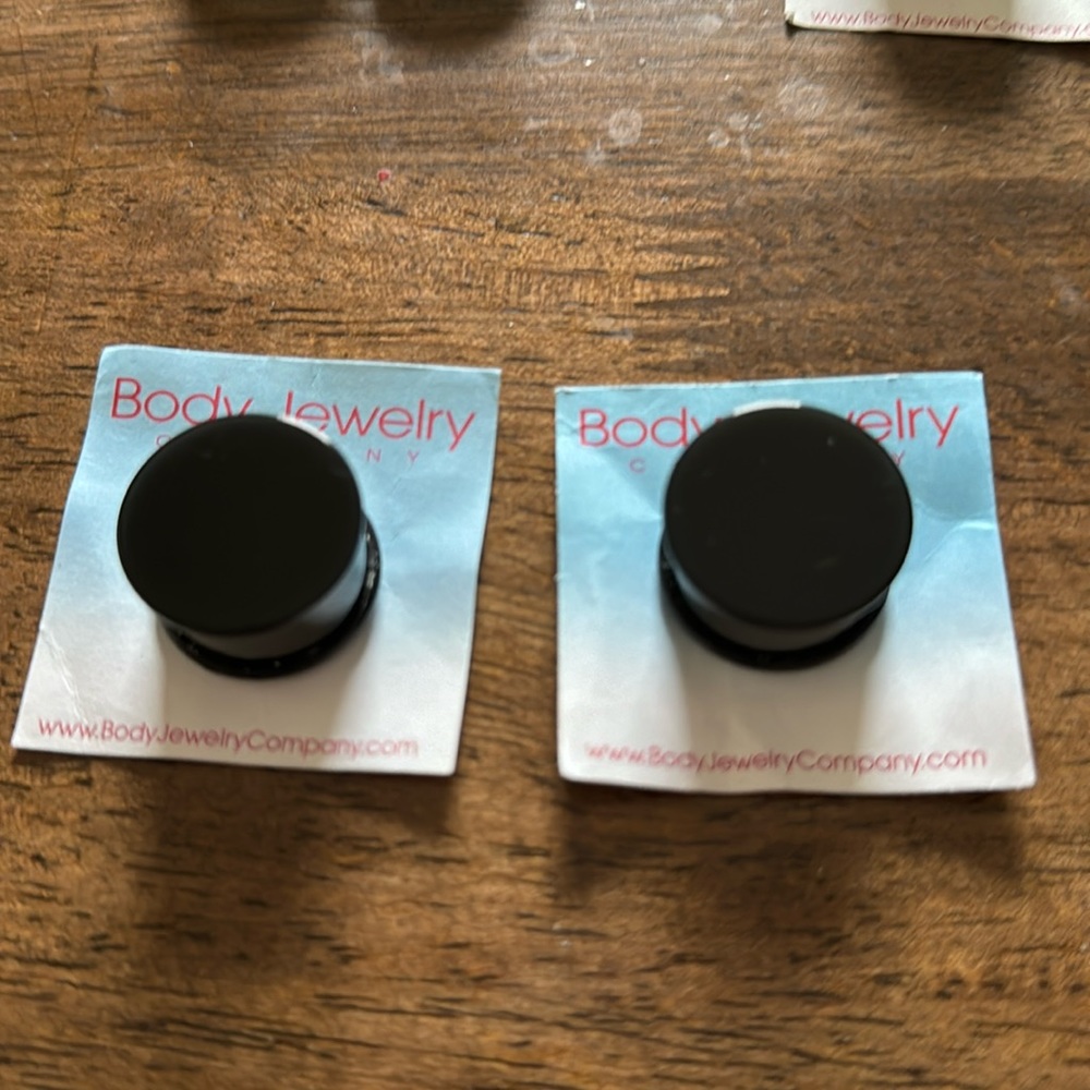 Black plastic plugs